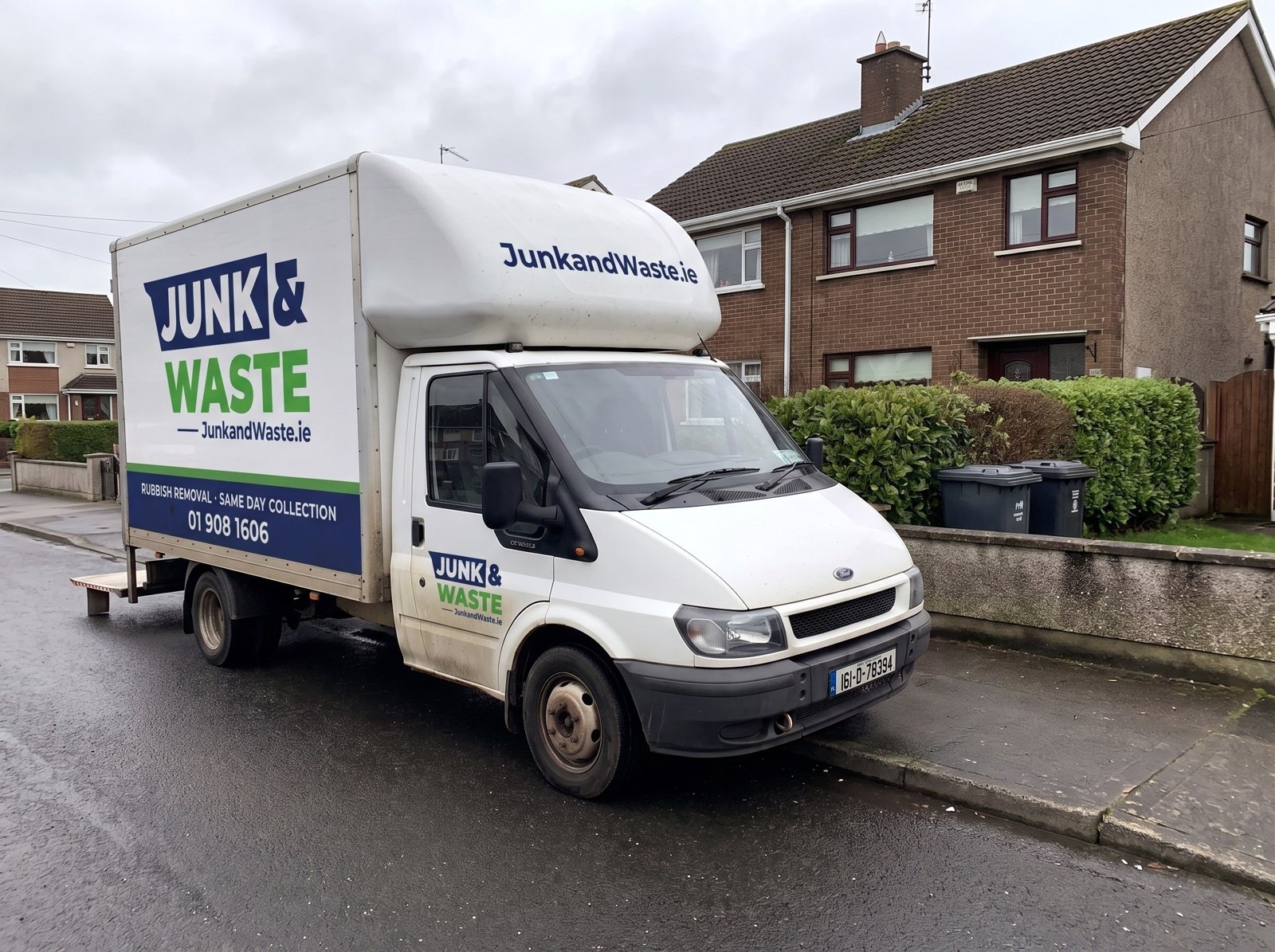 Junk & Waste van outside a semi-detached house